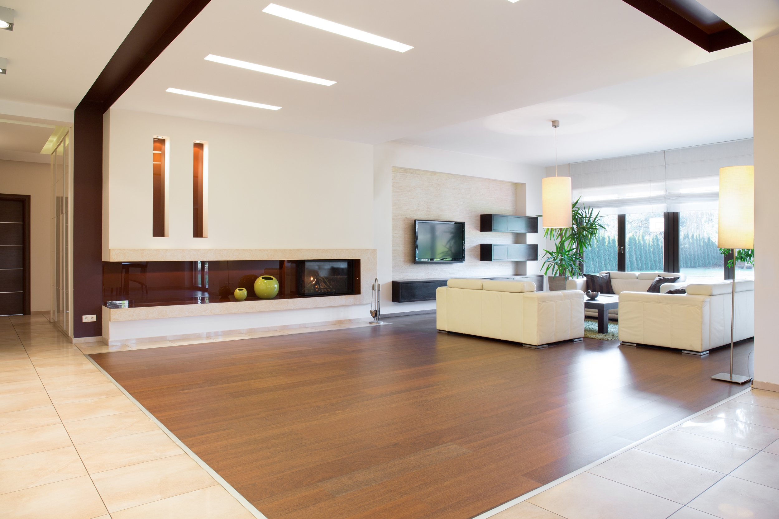 A living room with click vinyl flooring